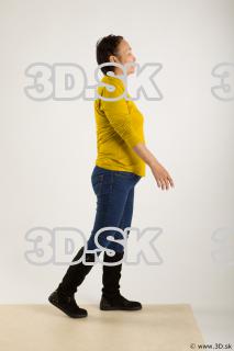 Walking reference of yellow sweater blue jeans Gwendolyn 0010